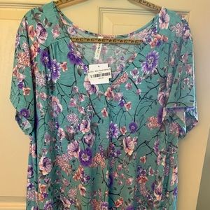 Brand new floral boutique top